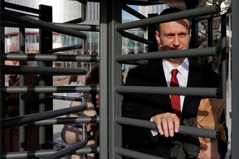 © Reuters. Russian opposition leader Navalny leaves the European court of Human Rights after a hearing regarding his case against Russia at the court in Strasbourg