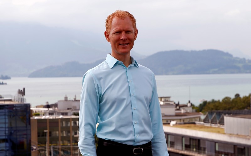 © Reuters. Johann Gevers, founder and CEO of Monetas, poses after an interview with Reuters on the roof of his headquarters in Zug