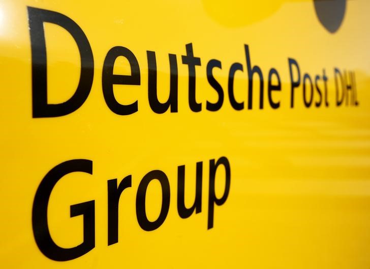 © Reuters. The logo of German postal and logistics group Deutsche Post DHL is seen on the delivery car "Street Scooter" in Aachen
