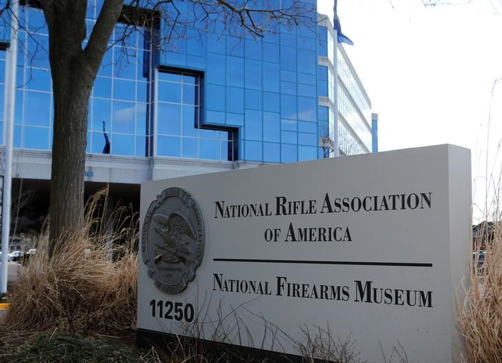 © Reuters. FILE PHOTO: A sign of the National Rifle Association is seen in front of their headquarters in Fairfax, Virginia