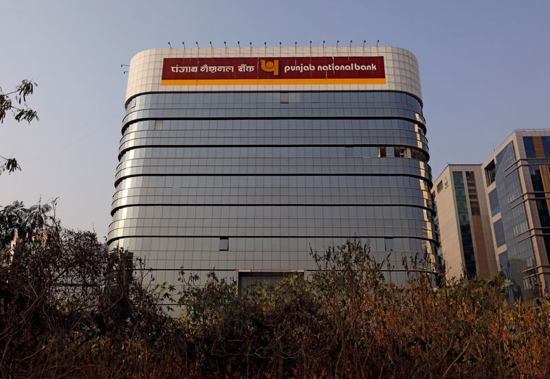 © Reuters. The logo of Punjab National Bank is seen on the facade of its office in Mumbai