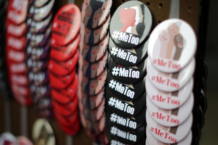 © Reuters. A vendor sells #MeToo badges a protest march for survivors of sexual assault and their supporters in Hollywood, Los Angeles