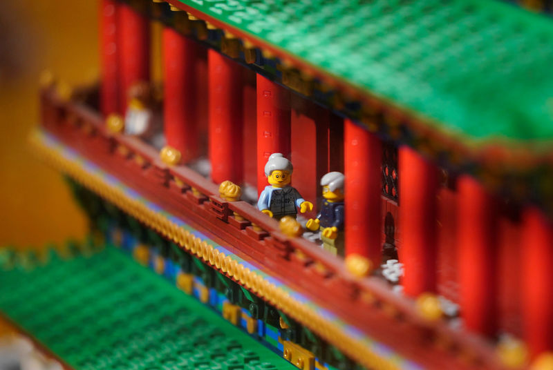 © Reuters. FILE PHOTO: Details of Zhengyang Gate Tower of Forbidden City made with Lego bricks are pictured at a Lego store in Beijing