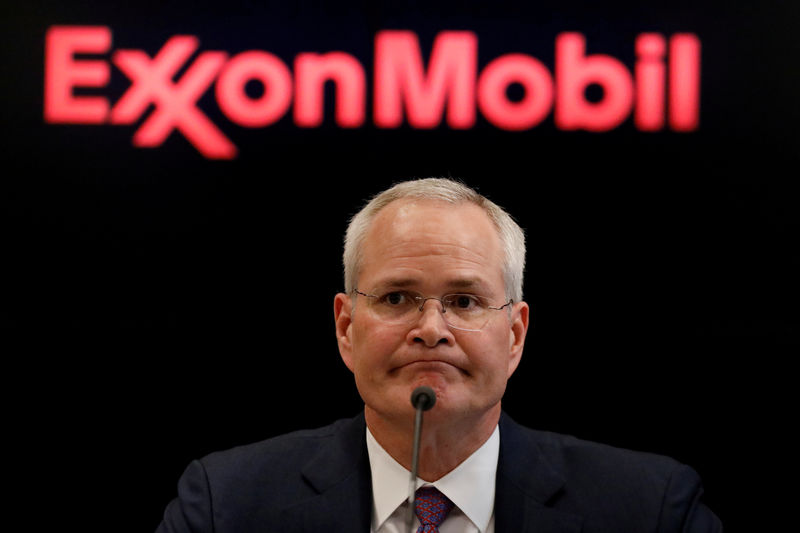 © Reuters. FILE PHOTO: Darren Woods, Chairman & CEO of Exxon Mobil Corporation speaks during a news conference at the NYSE