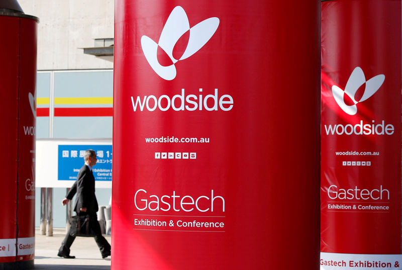 © Reuters. FILE PHOTO: Logos of Woodside Petroleum are seen at Gastech, the world's biggest expo for the gas industry, in Chiba