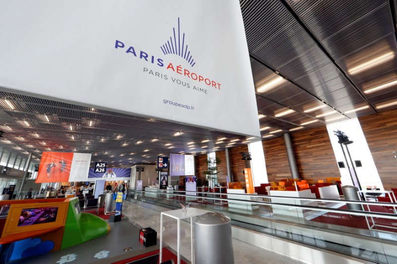 © Reuters. The ADP (Groupe Aeroports de Paris) new logo for travelers, "Paris Aeroport", is seen at a new departure gate in Orly airport,