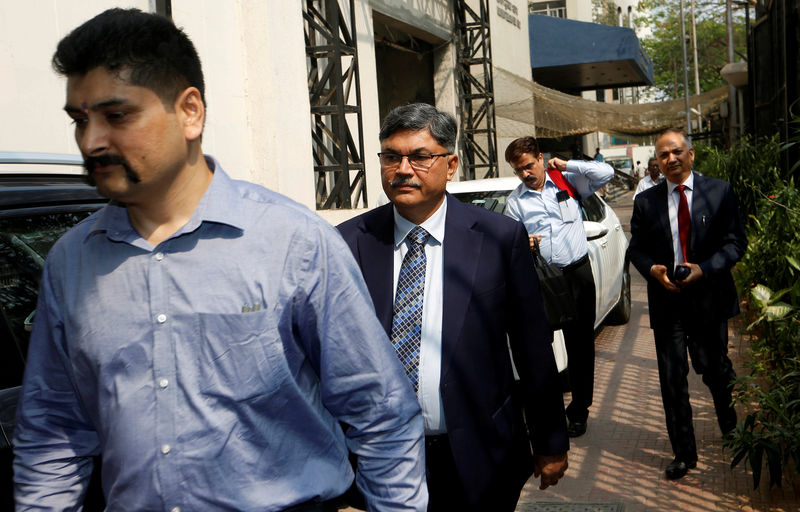 © Reuters. Sunil Mehta, Managing Director and Chief Executive Officer of Punjab National Bank, arrives at the Serious Fraud Investigation Office (SFIO) amid a widening probe into a $2 billion fraud, in Mumbai