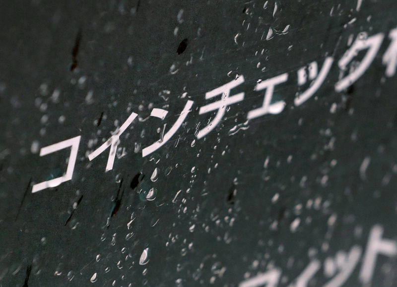 © Reuters. FILE PHOTO: Cryptocurrency exchange Coincheck's signboard is pictured in front of a building where their office is located in Tokyo