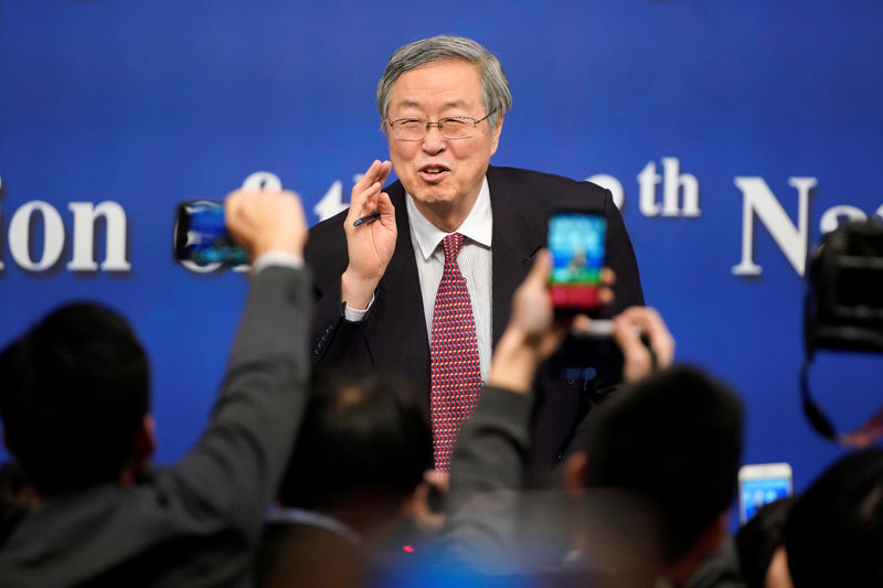 © Reuters. Presidente do banco central da China, Zhou Xiaochuan, durante coletiva de imprensa em Pequim