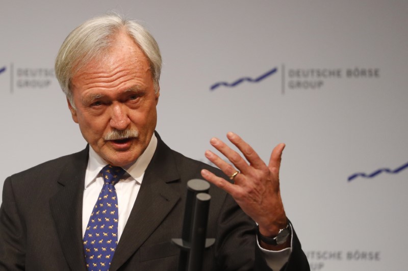 © Reuters. FILE PHOTO: Chairman of the supervisory board of Deutsche Boerse AG Faber delivers a speech at the New Year reception of the German stock market in Eschborn near Frankfurt