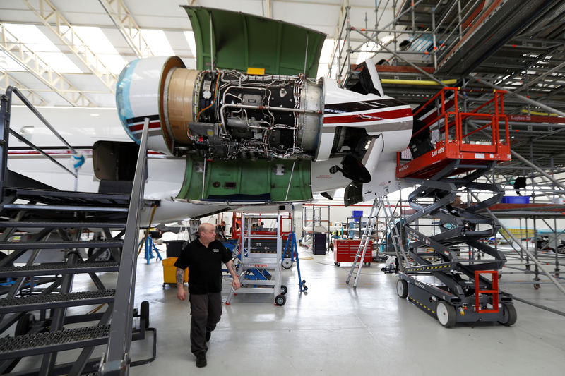 © Reuters. A technician works on a Bombardier Global aircraft at the company's service centre at Biggin Hill