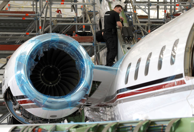 © Reuters. A technician works on a Bombardier Global aircraft at the company's service centre at Biggin Hill