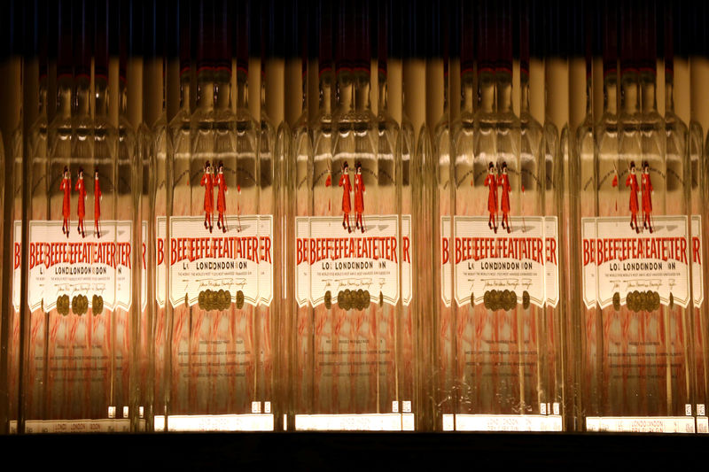 © Reuters. FILE PHOTO: Gin bottles are displayed at the Yeoman Warders Club at the Tower of London in London