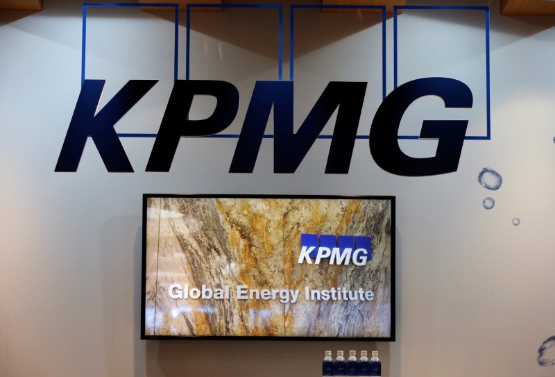 © Reuters. Logos of KPMG are seen in its booth at Gastech, the world's biggest expo for the gas industry, in Chiba