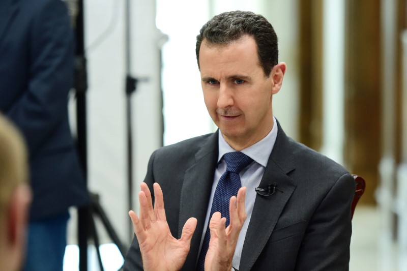 © Reuters. الرئاسة السورية: الأسد يتعهد بالتصدي "لسيناريوهات" ضرب وحدة سوريا