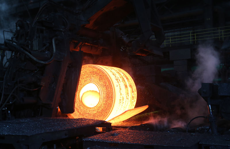 © Reuters. A steel coil is unrolled on the line at the Novolipetsk Steel PAO steel mill in Farrell, Pennsylvania