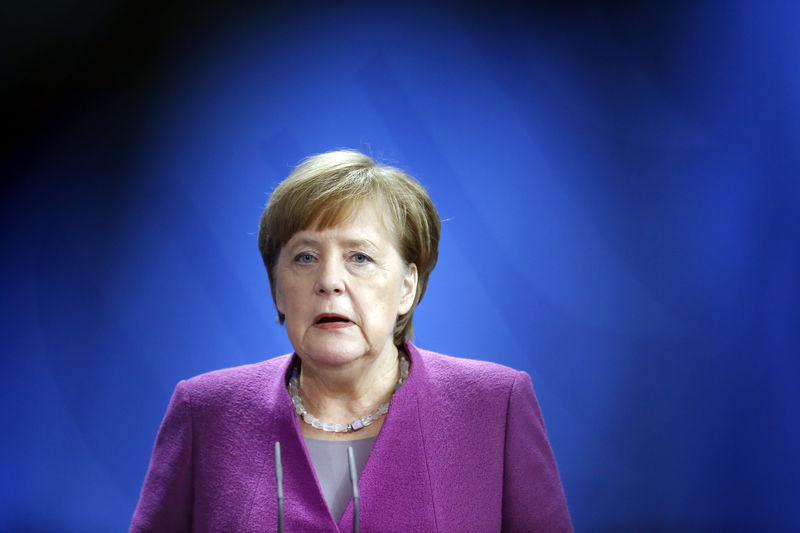© Reuters. German Chancellor Angela Merkel addresses a news conference after talks at the chancellery in Berlin