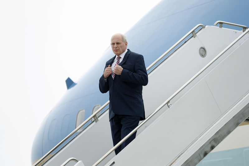 © Reuters. White House Chief of Staff John Kelly descends the stairs of Air Force One after arriving at Marine Corps Air Station Miramar in San Diego, California.