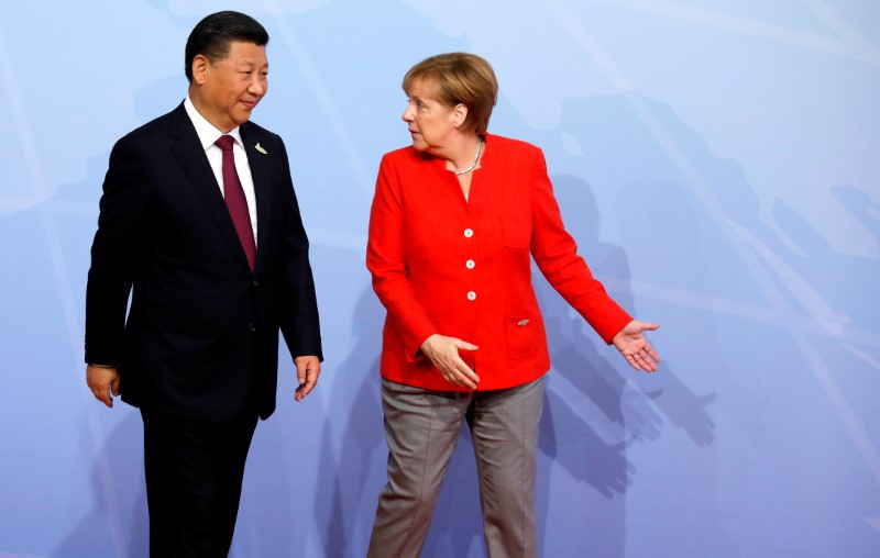 © Reuters. اتفاق ميركل وشي على مناقشة قضية إنتاج الصلب في إطار مجموعة العشرين