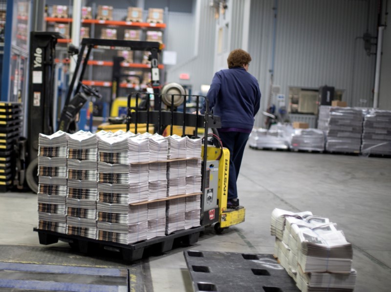 © Reuters. Copies of the Montreal Gazette newspaper are bundled on a skid at TC Transcontinental Printing, a newspaper printing plant, in Montreal