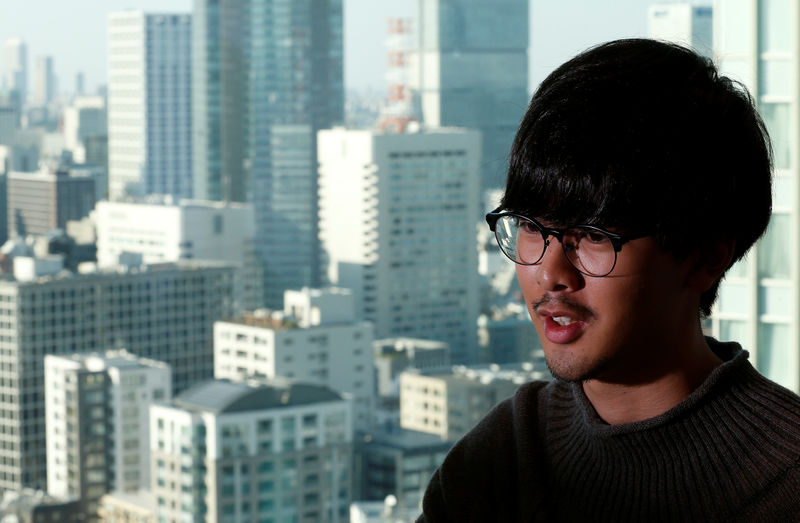 © Reuters. Fukuda, a software engineer at Next Currency Inc, speaks during an interview with Reuters at the company's headquarters in Tokyo