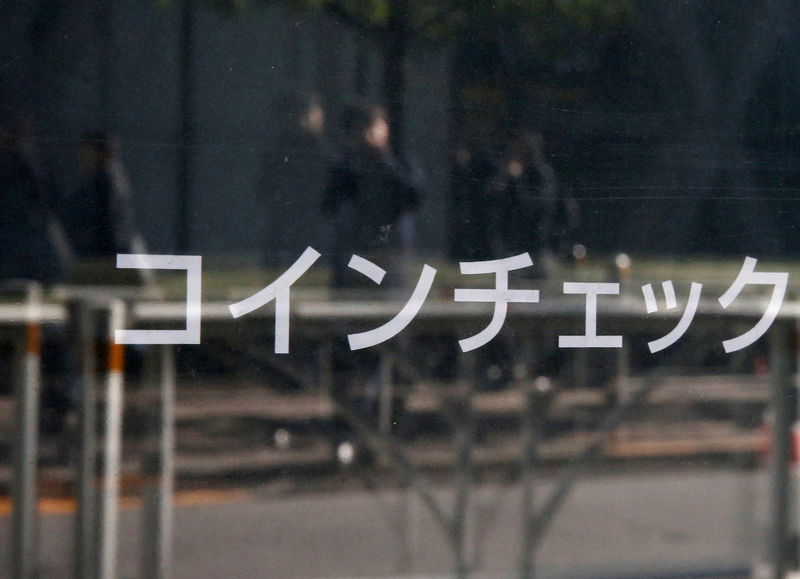 © Reuters. FILE PHOTO: Cryptocurrency exchange Coincheck's signboard is pictured in front of a building where their office is located, in Tokyo