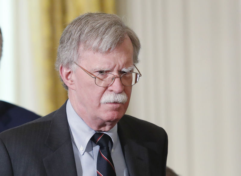 © Reuters. Bolton arrives for Trump-Merkel  joint news conference at the White House in Washington