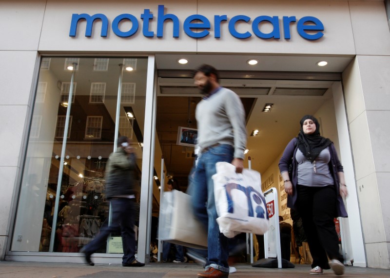 © Reuters. Customers leave a Mothercare shop in London