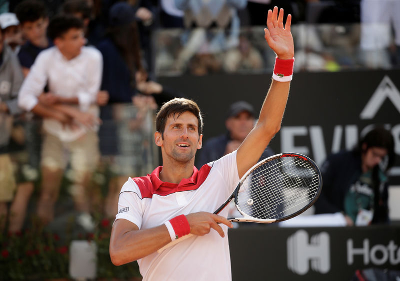 © Reuters. تأهل ديوكوفيتش ونيشيكوري للدور الثاني في بطولة إيطاليا المفتوحة للتنس