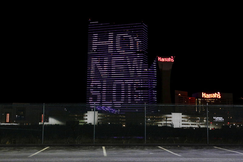 © Reuters. FILE PHOTO: The side of Harrah's Resort Atlantic City advertises for new slot machines in Atlantic City