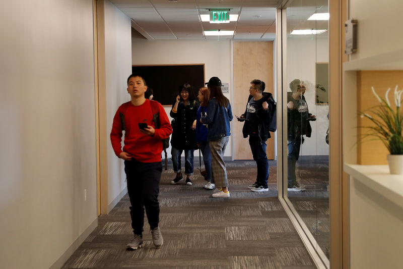 © Reuters. People congregate inside ZGC Innovation Center in Santa Clara, California