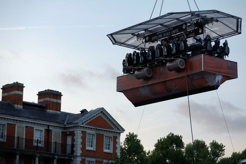 © Reuters. Twenty gamers play "Worlds Adrift",  whilst suspended in a life size "Sky Ship" based on the game, above  Chelsea College of Arts during the launch in London