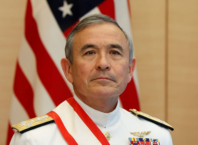 © Reuters. FILE PHOTO -  Admiral Harry Harris, Commander of the United States Pacific Command, waits for arrival of Japan's Prime Minister Shinzo Abe before their meeting in Tokyo