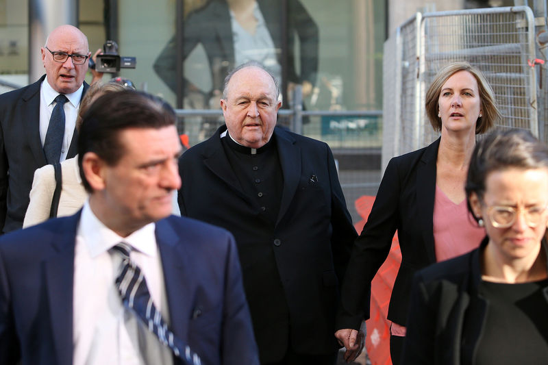 © Reuters. Archbishop Philip Wilson arrives at Newcastle Local Court