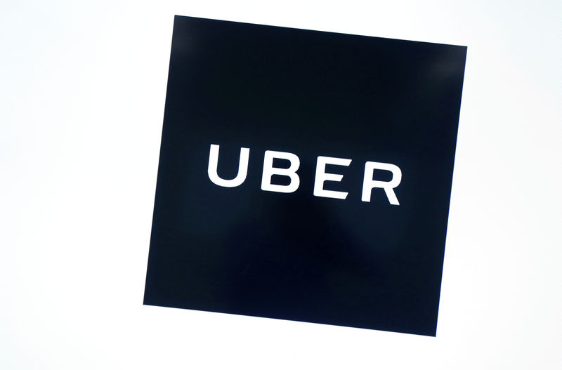 © Reuters. FILE PHOTO: Uber's logo is pictured at its office in Tokyo