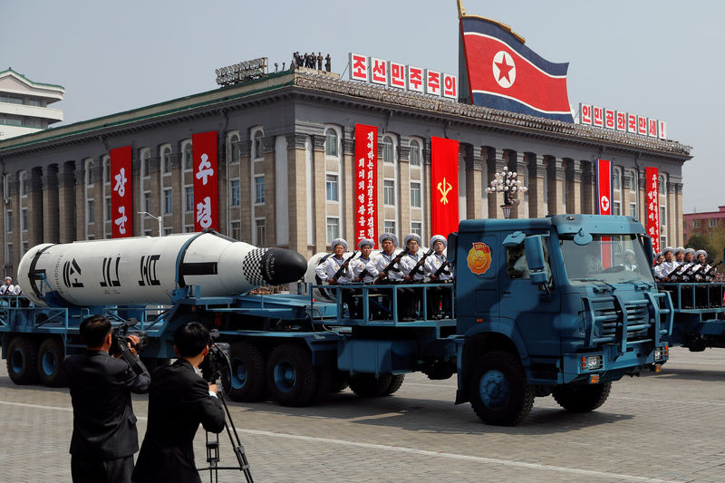 © Reuters. FILE PHOTO: A North Korean navy truck carries a submarine-launched ballistic missile in Pyongyang