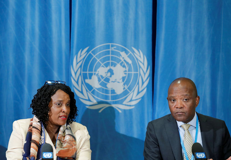 © Reuters. Nkengasong Director of the Africa Centres for Disease Control and Prevention and Agama-Anyetei Head of Health, Nutrition and Population at the African Union Commission attend a news conference in Geneva