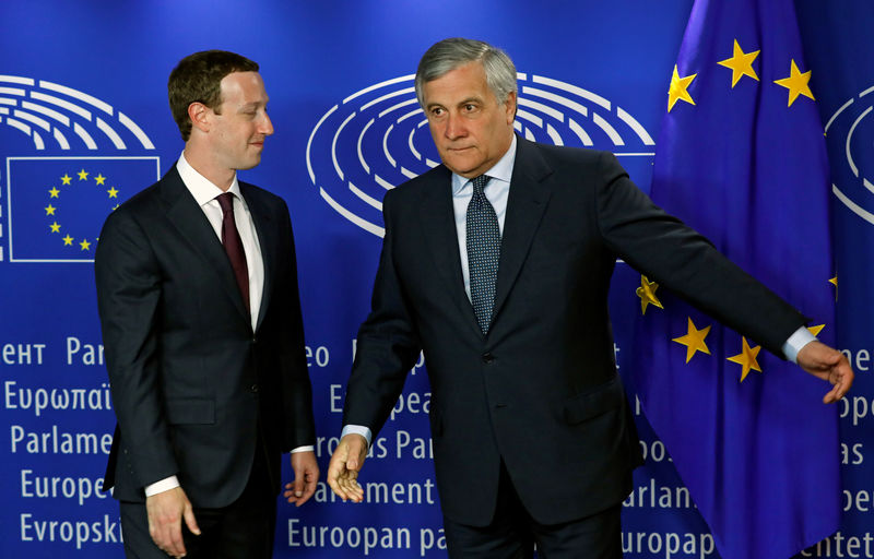 © Reuters. European Parliament President Antonio Tajani welcomes Facebook's CEO Mark Zuckerberg at the European Parliament in Brussels