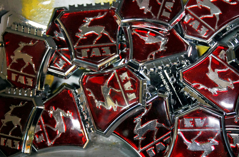 © Reuters. FILE PHOTO: The emblems of GAZ car factory is pictured at an assembly line at its Nizhny Novgorod facilities