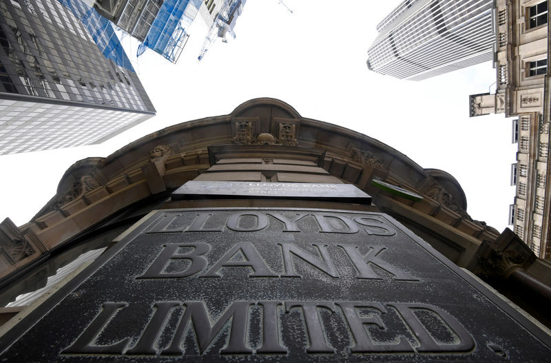 © Reuters. FILE PHOTO: Signage at the entrance to a Lloyds Bank branch in the City of London financial district