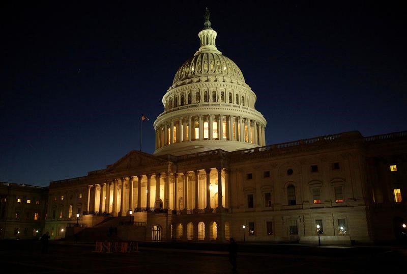 © Reuters. FILE PHOTO: The U.S. Capitol Building is lit at sunset in Washington