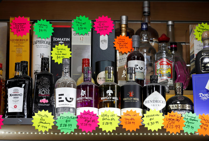 © Reuters. FILE PHOTO: Bottles of alcoholic beverages are seen for sale in a shop in Glasgow