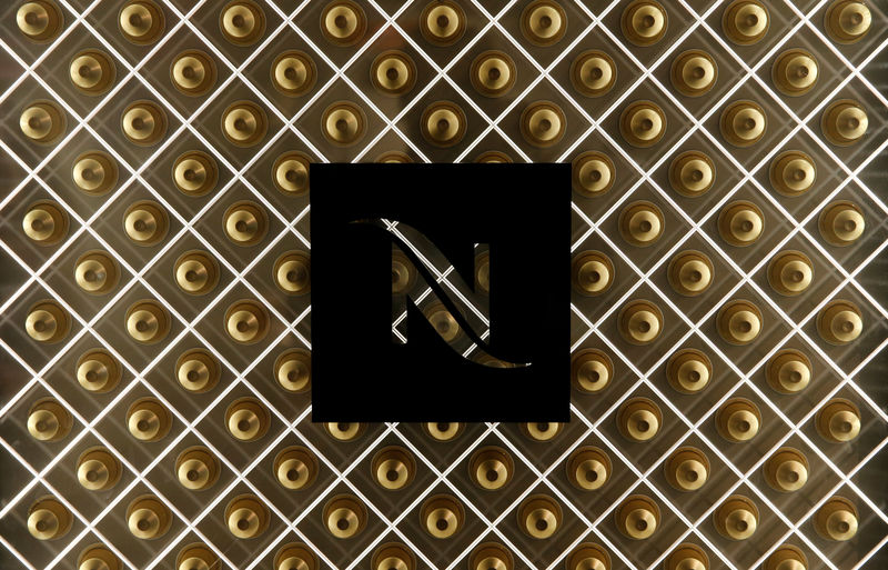 © Reuters. FILE PHOTO: A logo of coffee maker Nespresso is pictured in the showroom at Nestle headquarters in Vevey