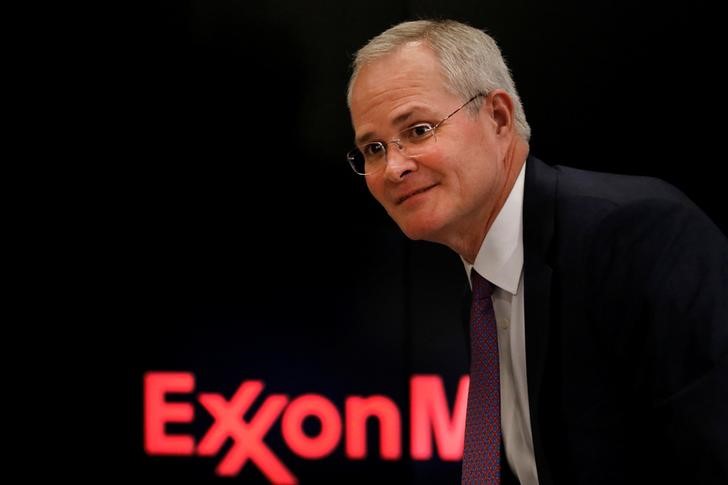 © Reuters. Darren Woods, Chairman & CEO, Exxon Mobil Corporation exits after a news conference at the NYSE