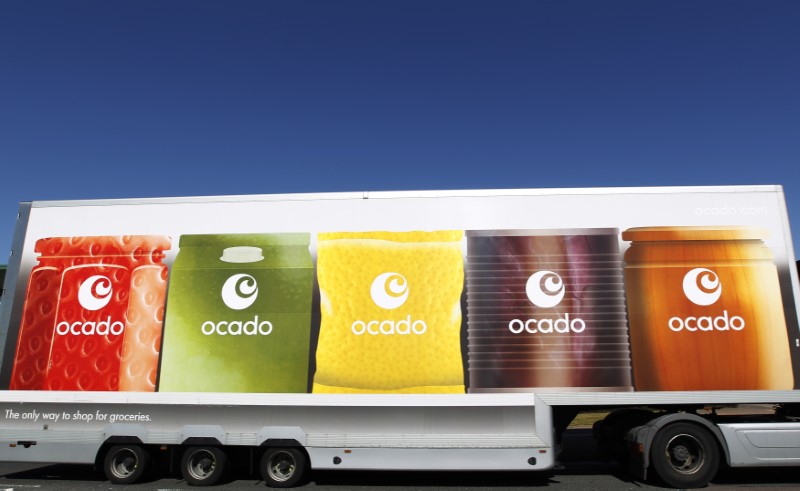 © Reuters. FILE PHOTO: An Ocado truck returns to the Ocado depot in Hatfield, southern England