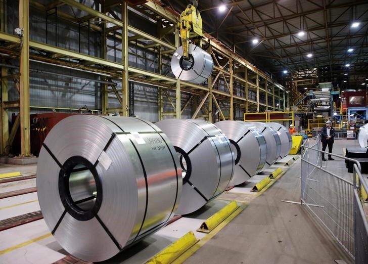 © Reuters. Rolled up steel sits in the ArcelorMittal Dofasco steel plant in Hamilton