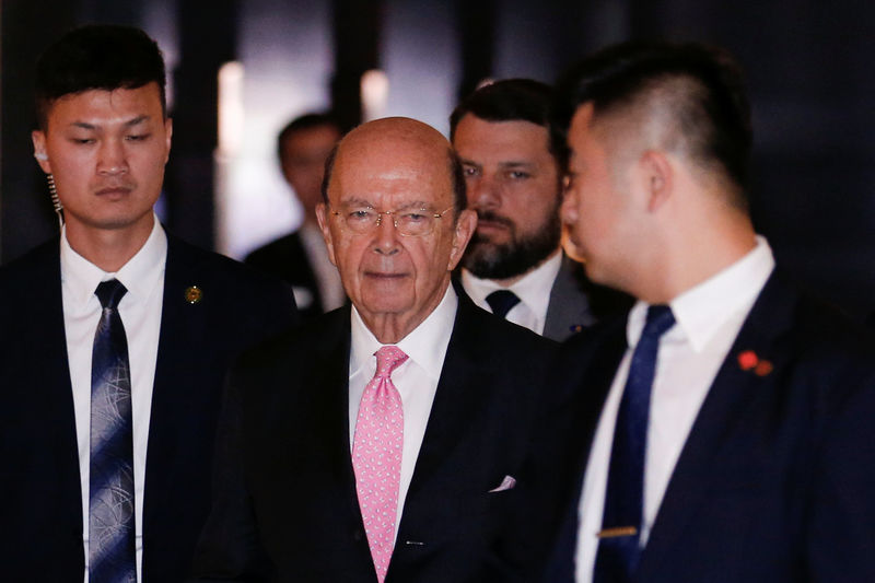 © Reuters. U.S. Commerce Secretary Wilbur Ross leaves a hotel ahead of trade talks with Chinese officials in Beijing