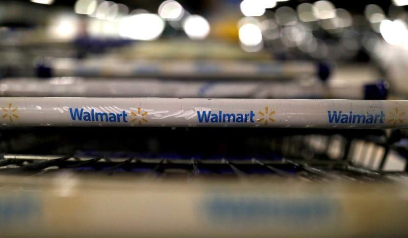 © Reuters. FILE PHOTO: The logo of Walmart is seen on shopping trolleys at their store in Sao Paulo