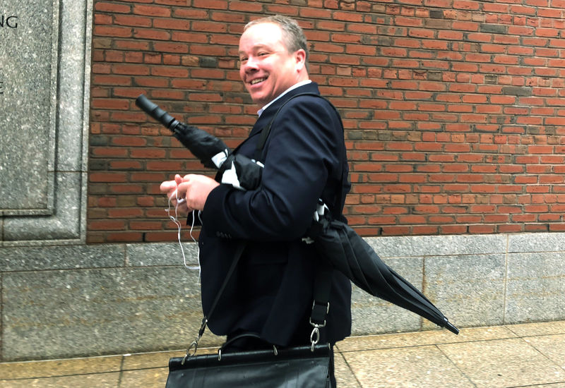 © Reuters. FILE PHOTO: McLellan, a former executive vice president of State Street Corporation, exits the federal courthouse in Boston