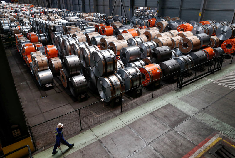 © Reuters. FILE PHOTO: Metal coils are seen at ArcelorMittal steel plant in Ghent